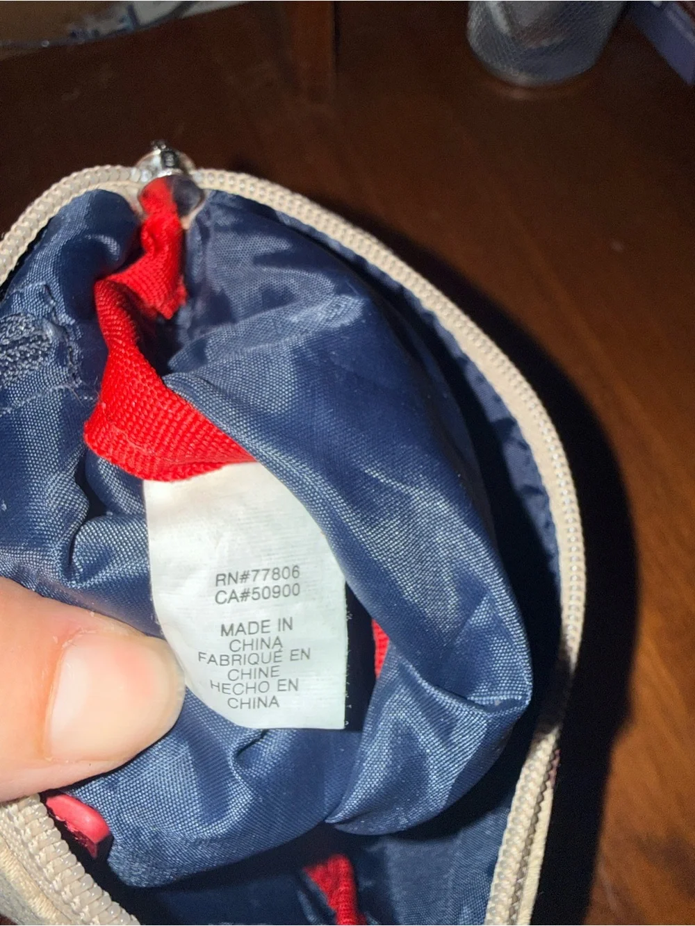 Tommy Hilfiger compact wristlet